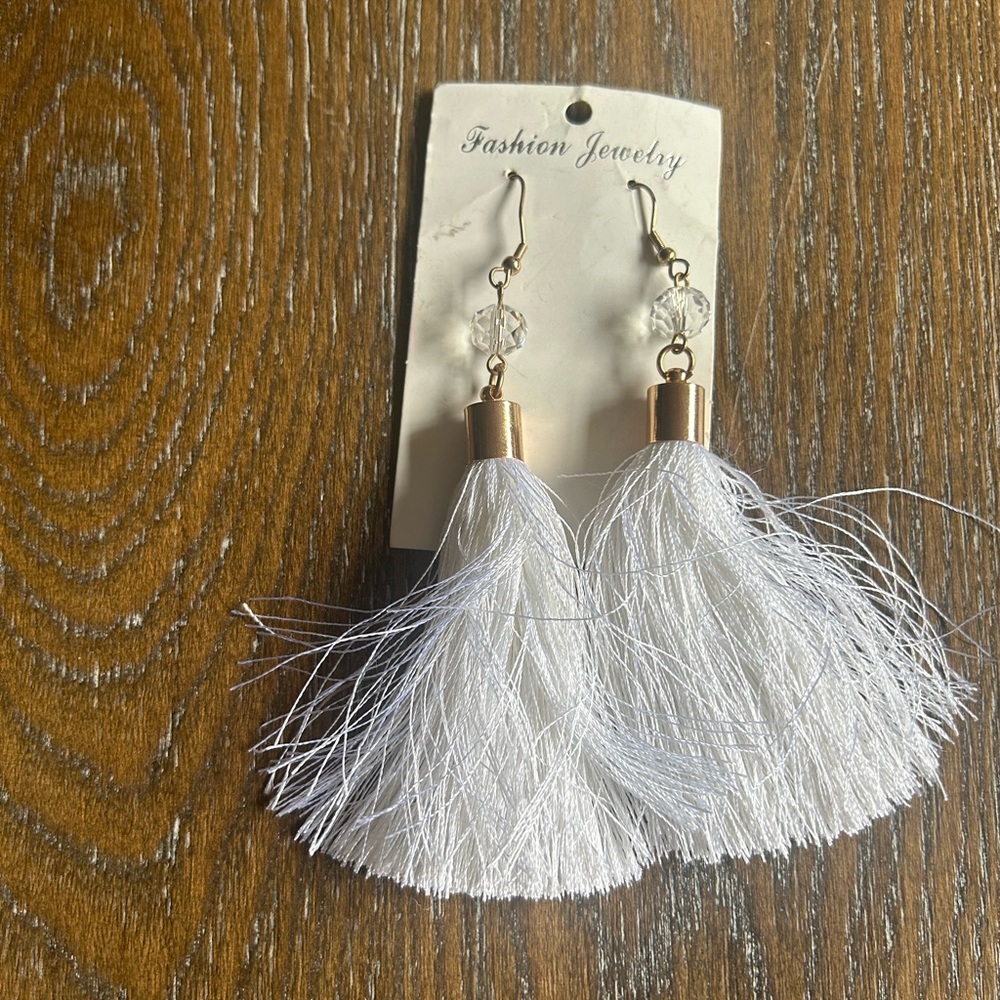 Fringe white statement earrings